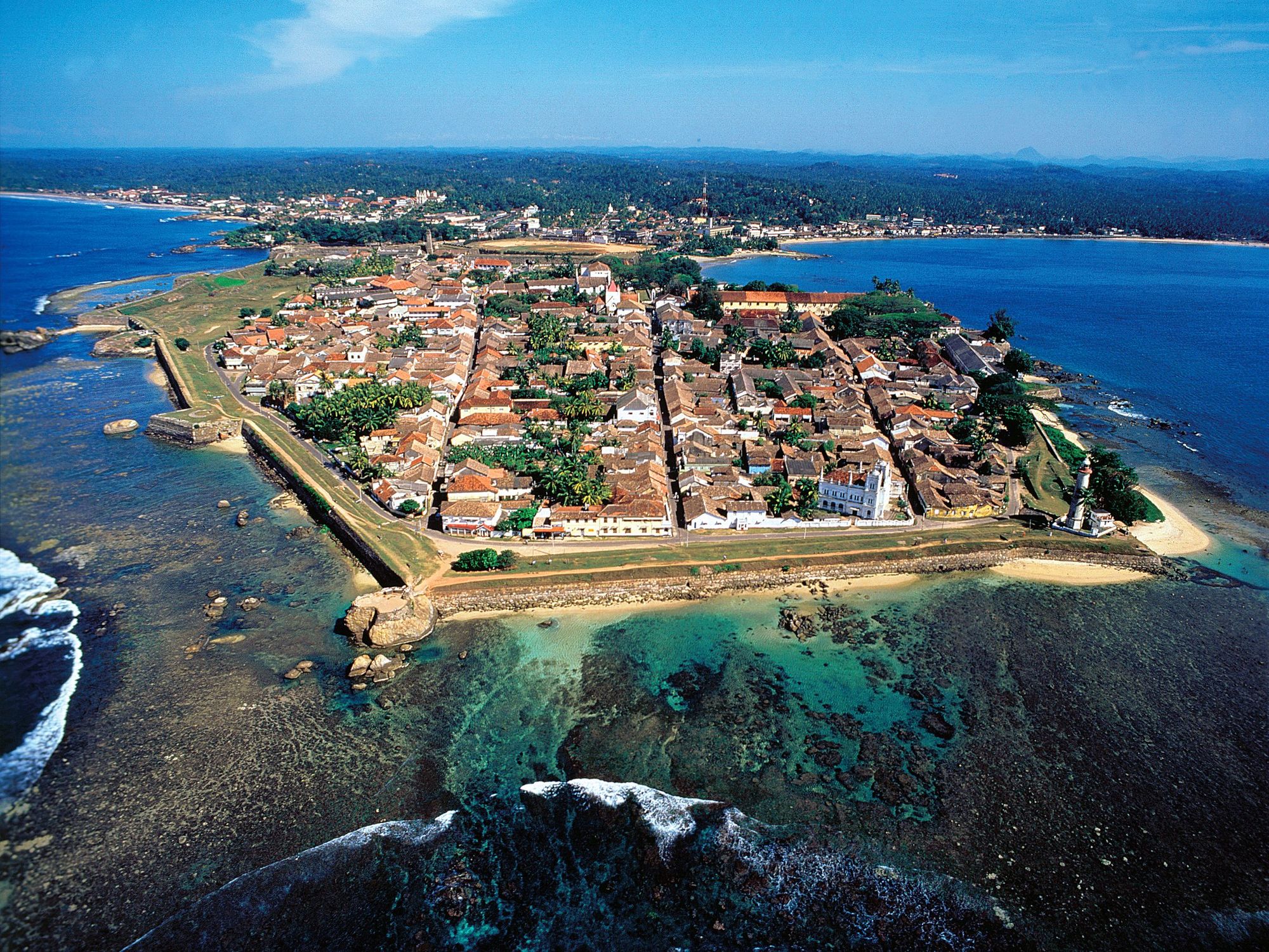 Aerial view of Galle Fort: the old town inside its ramparts on a headland, with the ocean on three sides