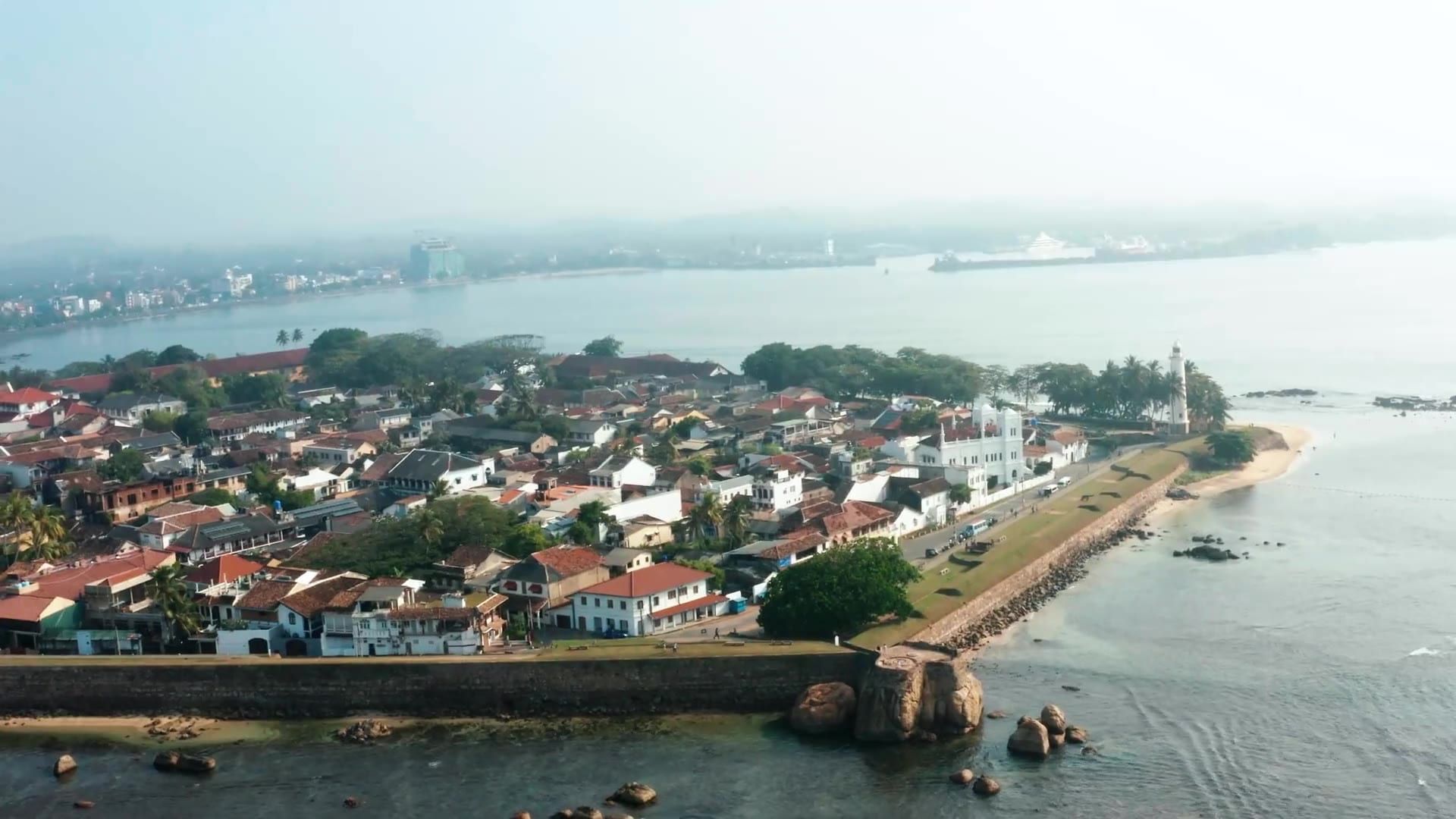 Galle Fort from the air: ramparts, red roofs and the lighthouse on the point
