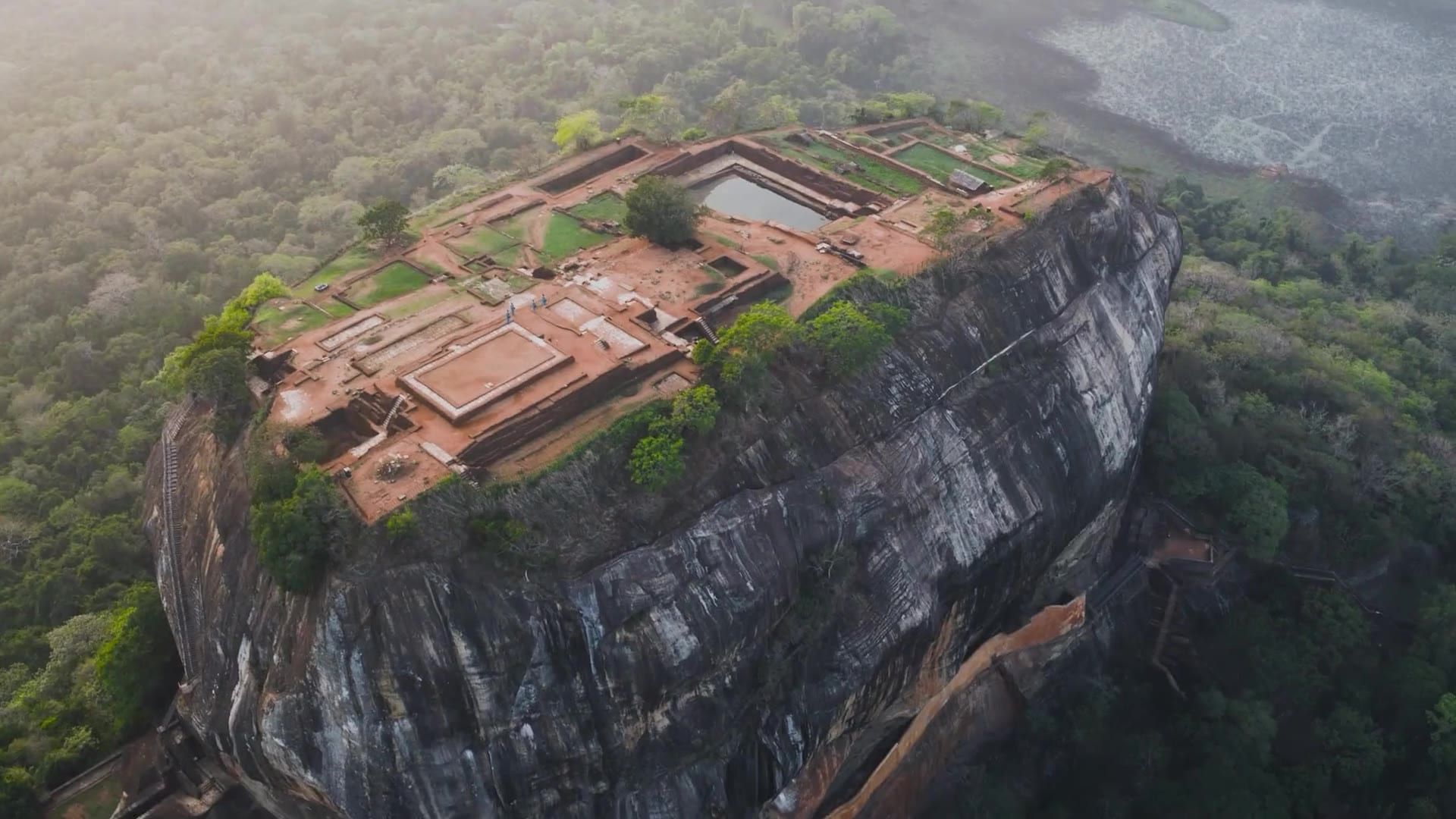 Sigiriya rock fortress from the air, the palace ruins on its flat summit